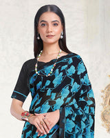 Vishal Prints Smokey Black And Fountain Blue Printed Georgette Saree With Fancy Border