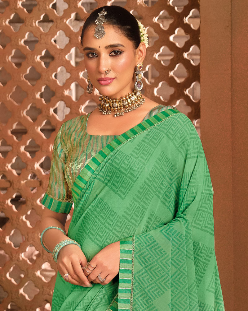 Vishal Prints Dusty Green Printed Georgette Saree With Fancy Border