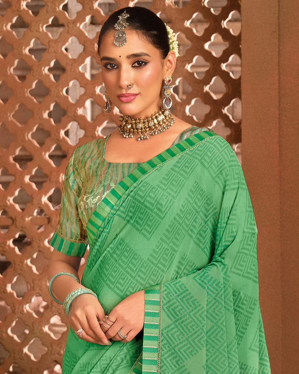 Vishal Prints Dusty Green Printed Georgette Saree With Fancy Border