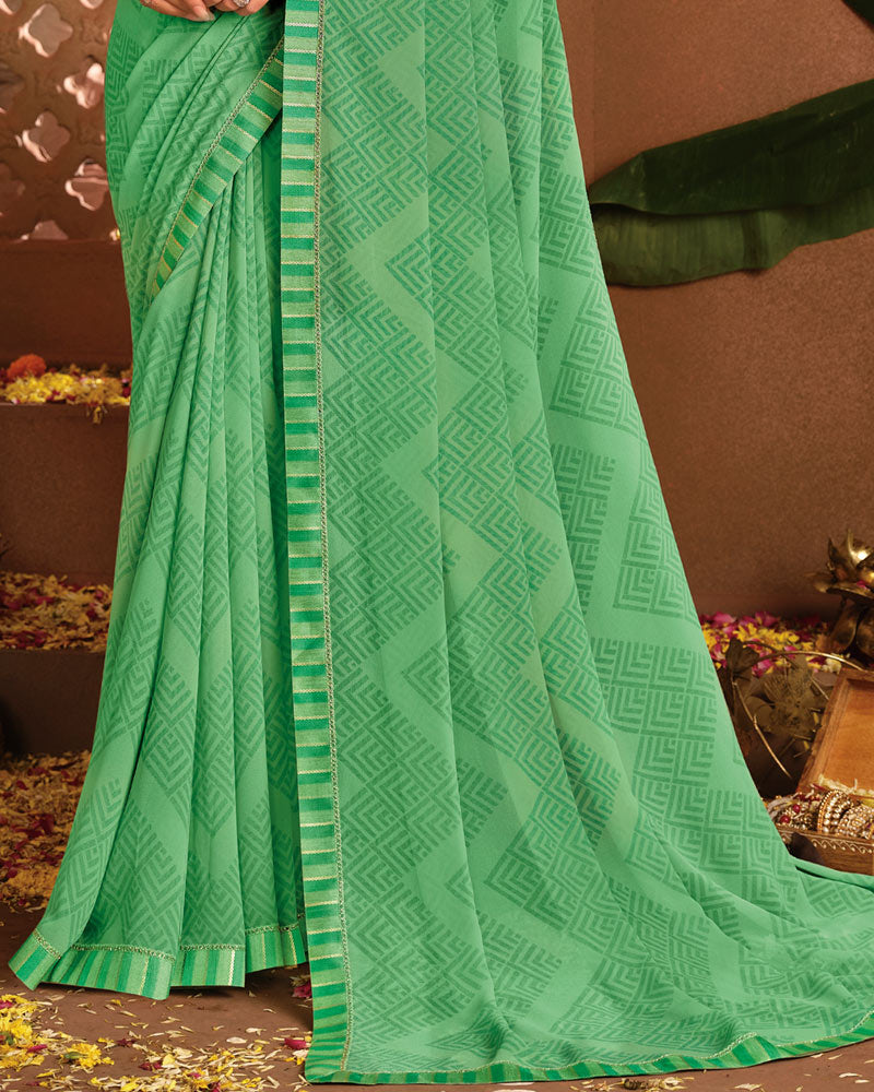 Vishal Prints Dusty Green Printed Georgette Saree With Fancy Border