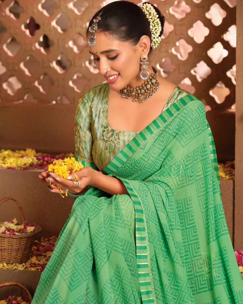 Vishal Prints Dusty Green Printed Georgette Saree With Fancy Border