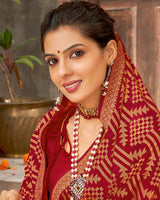Vishal Prints Dark Red Brasso Saree With Foil Print And Zari Border