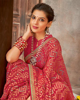 Vishal Prints Pastel Red Brasso Saree With Foil Print And Zari Border