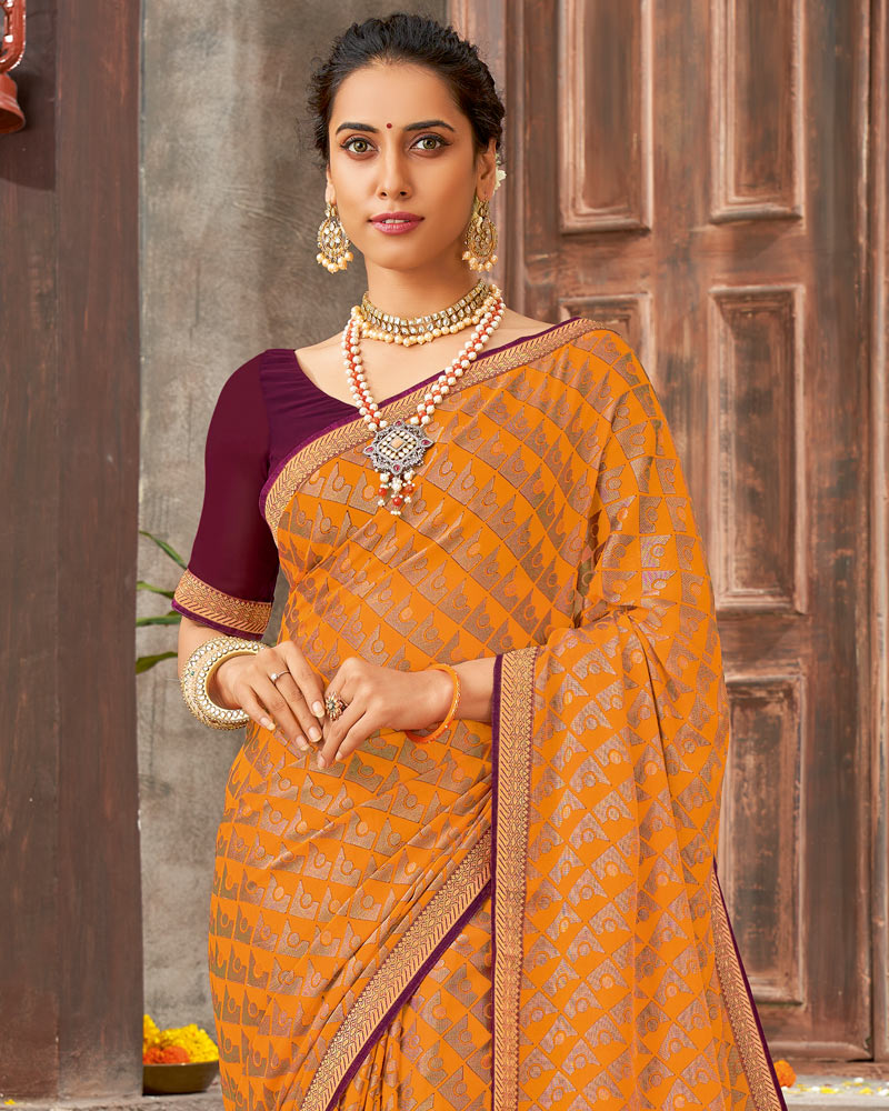 Vishal Prints Dark Orange Brasso Saree With Foil Print And Zari Border