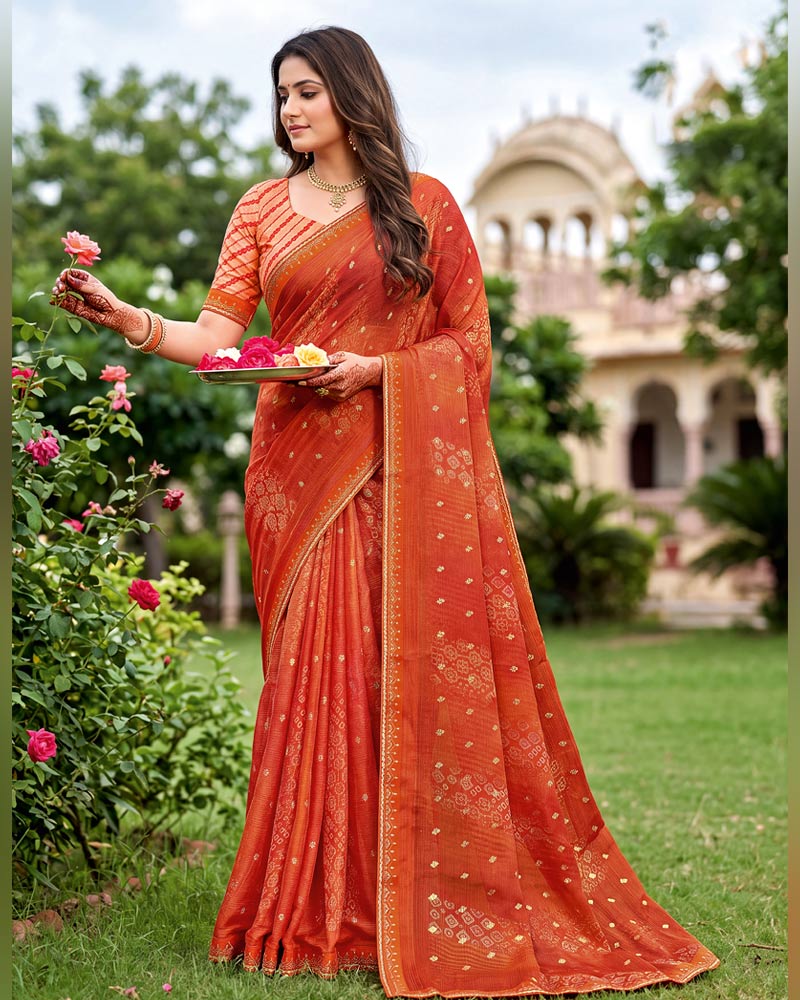 Vishal Prints Dusty Orange Traditional Print Fancy Chiffon Saree With Foil Print And Embroidery Border