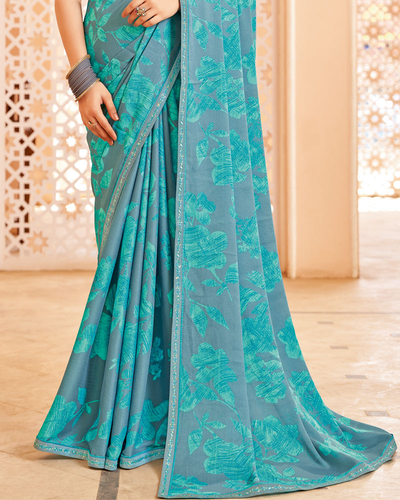 Vishal Prints Dark Pastel Blue Printed Brasso Saree With Fancy Border