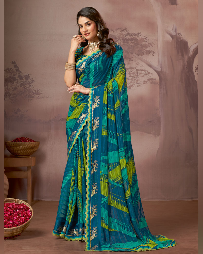 Vishal Prints Deep Teal Blue Printed Fancy Chiffon Saree With Foil Print And Fancy Embroidery Border
