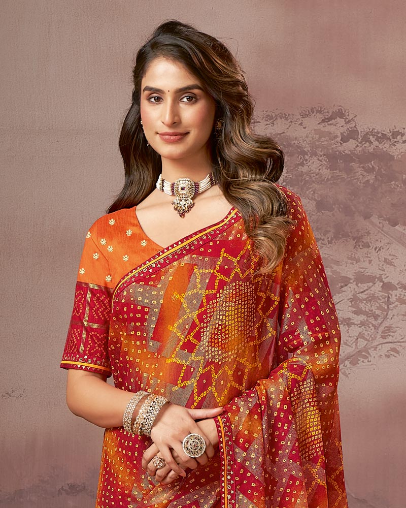 Vishal Prints Flame Orange And Cherry Red Printed Brasso Saree With Foil Print And Fancy Embroidery Border