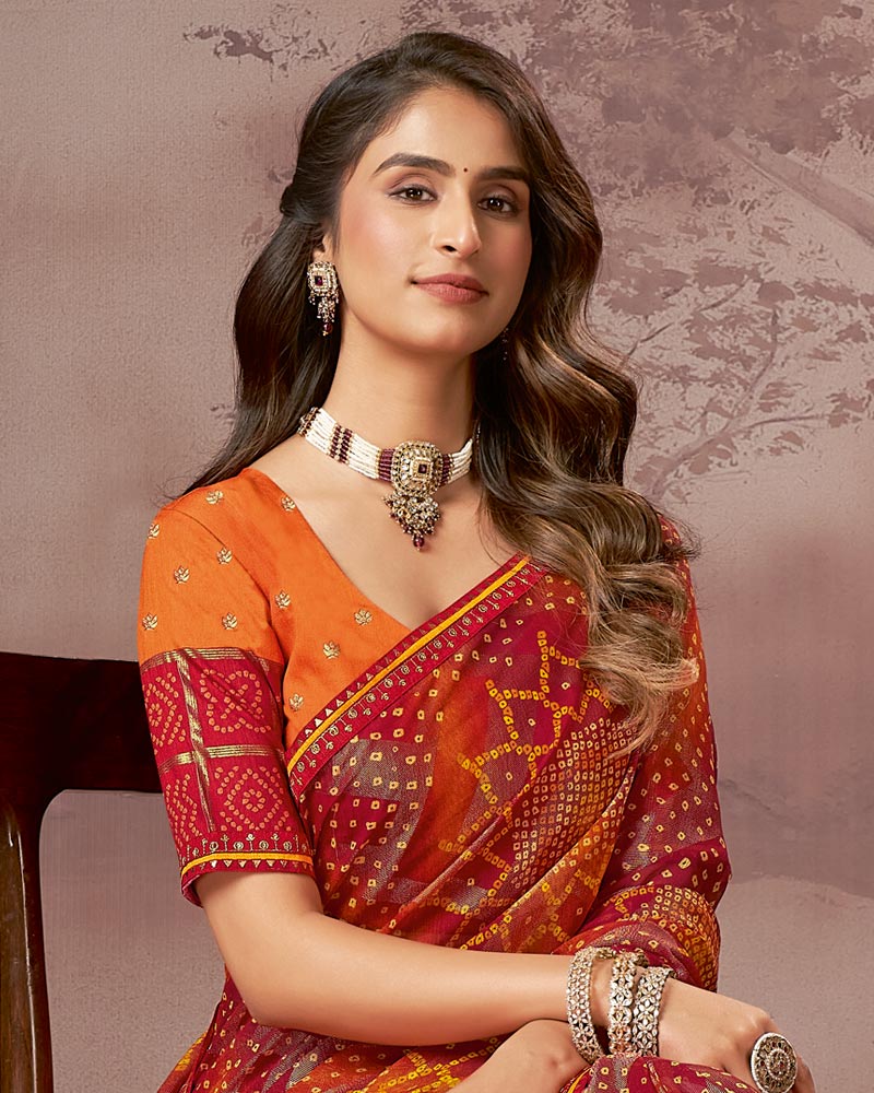 Vishal Prints Flame Orange And Cherry Red Printed Brasso Saree With Foil Print And Fancy Embroidery Border
