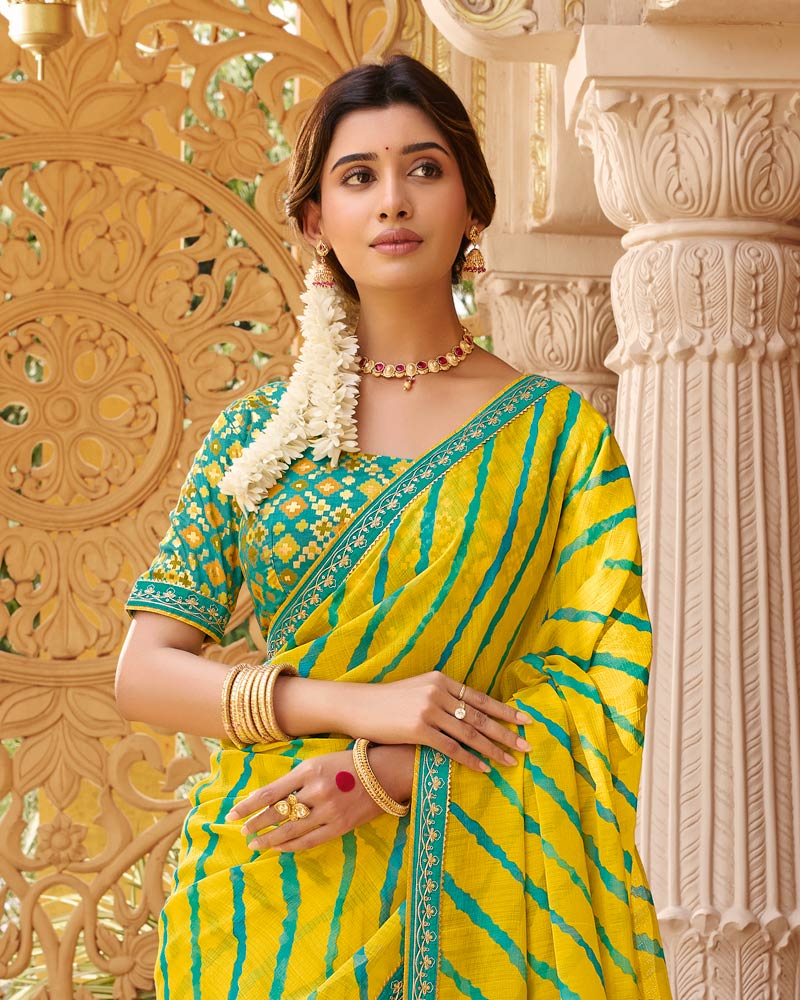 Vishal Prints Deep Yellow Fancy Chiffon Traditional Print Saree With Foil Print And Fancy Border