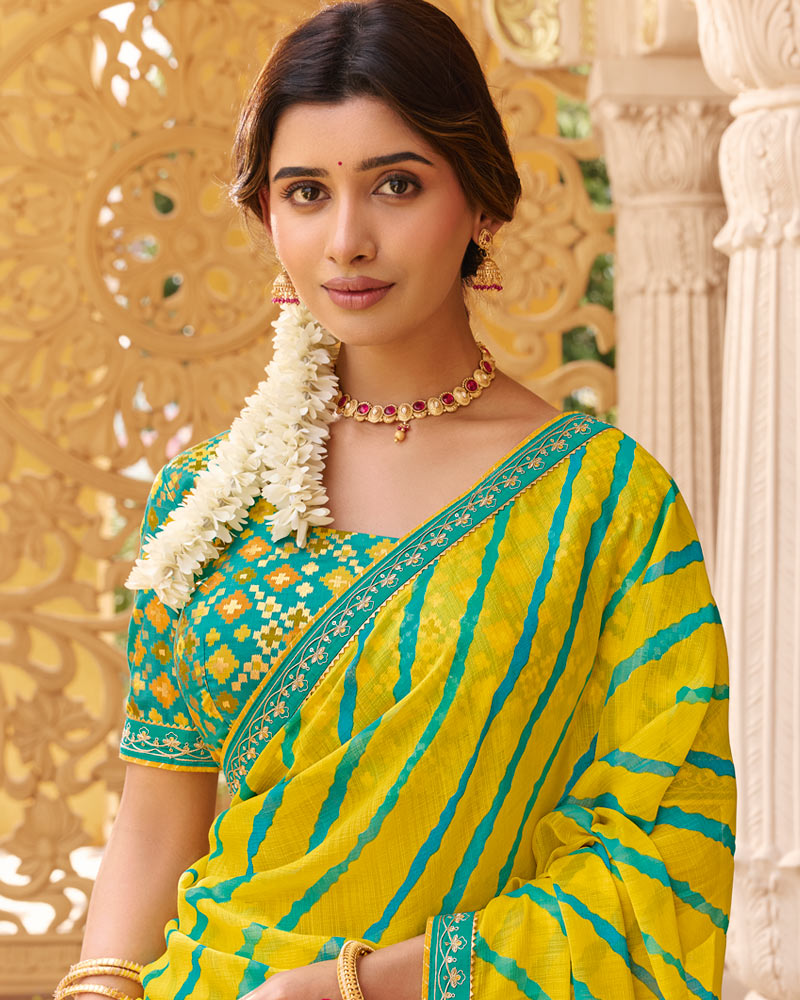 Vishal Prints Deep Yellow Fancy Chiffon Traditional Print Saree With Foil Print And Fancy Border