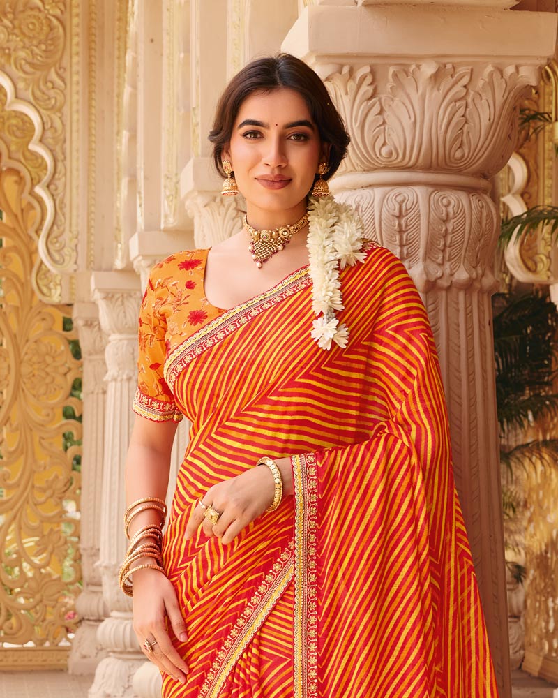 Vishal Prints Orange Fancy Chiffon Traditional Print Saree With Foil Print And Fancy Border