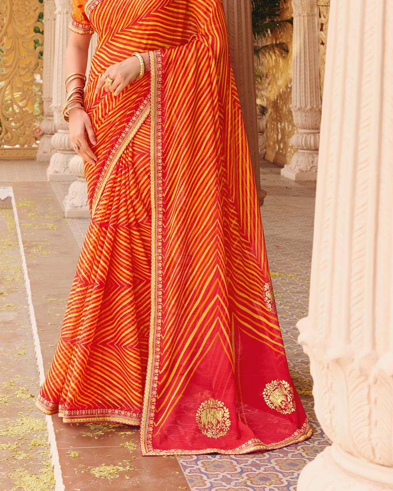 Vishal Prints Orange Fancy Chiffon Traditional Print Saree With Foil Print And Fancy Border