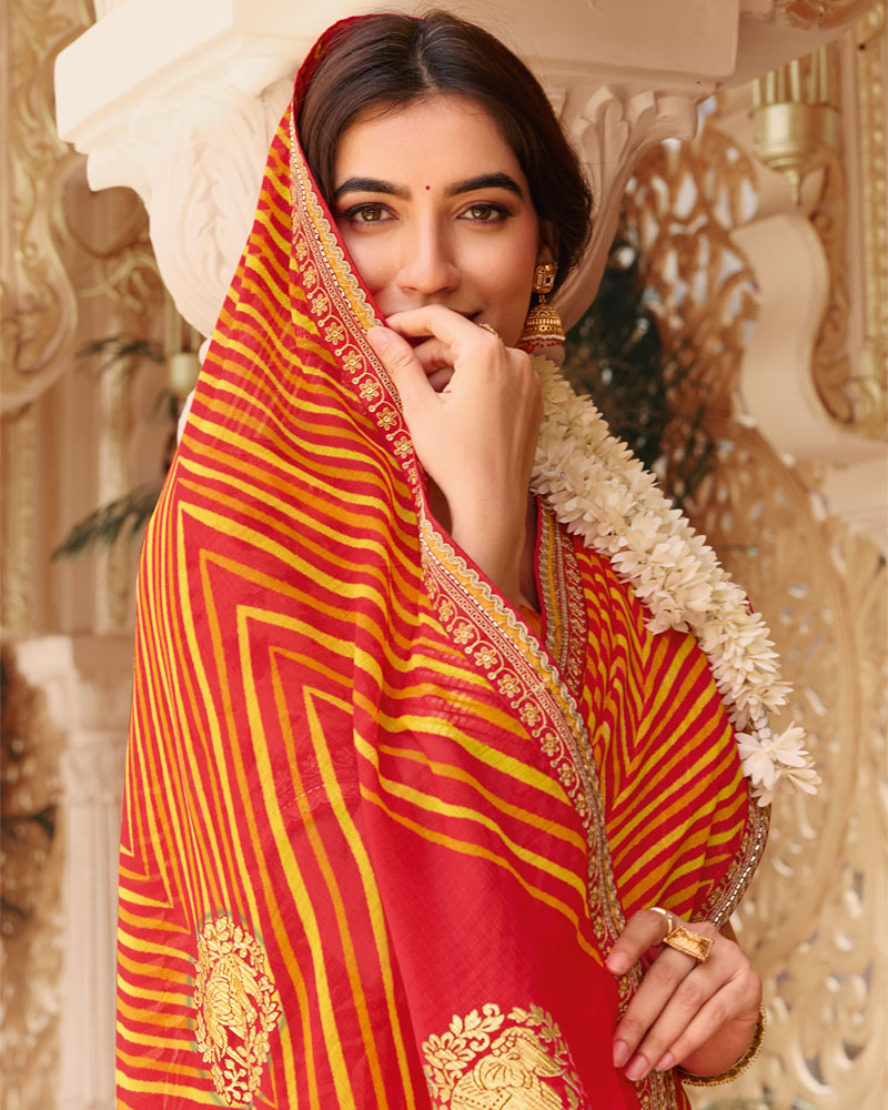 Vishal Prints Orange Fancy Chiffon Traditional Print Saree With Foil Print And Fancy Border