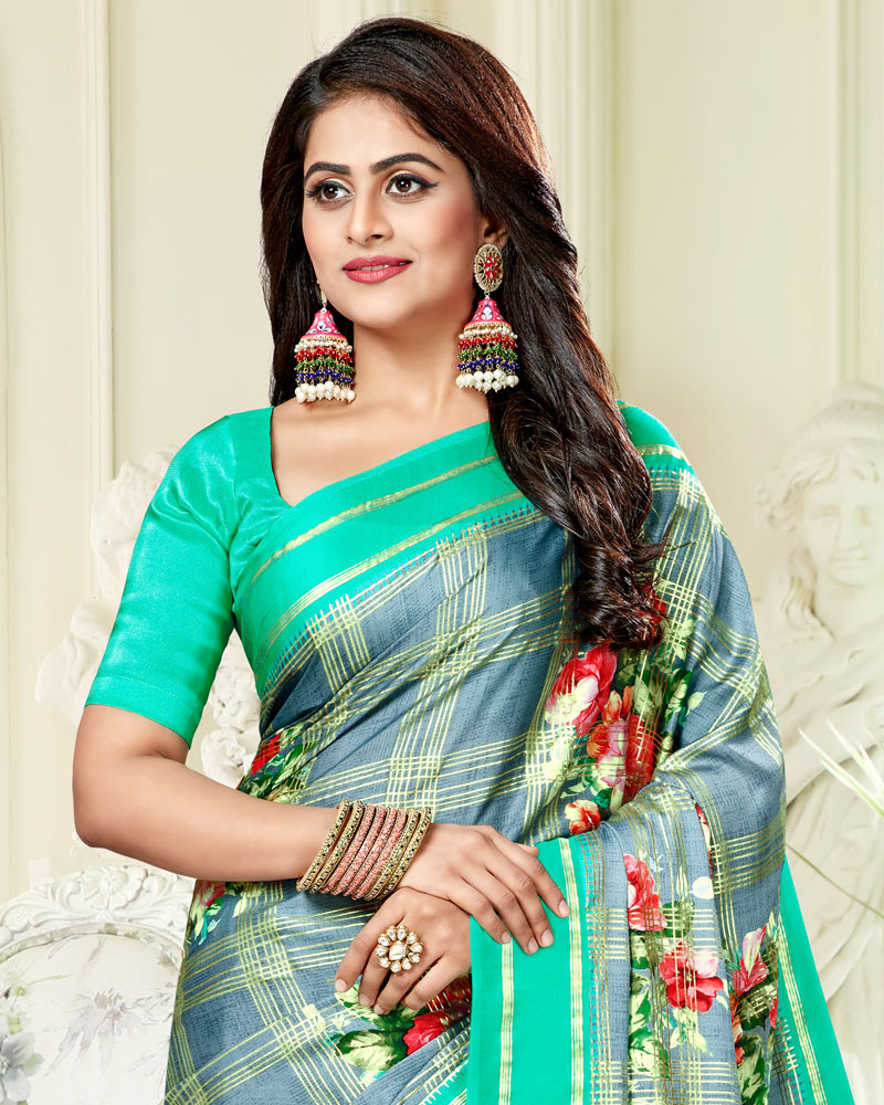 Vishal Prints Pastel Blue Satin Saree With Foil Print And Tassel