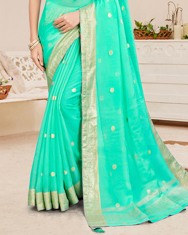 Vishal Prints Light Aqua Green Designer Georgette Saree With Viscose Lining, Foil Work And Zari Weaving