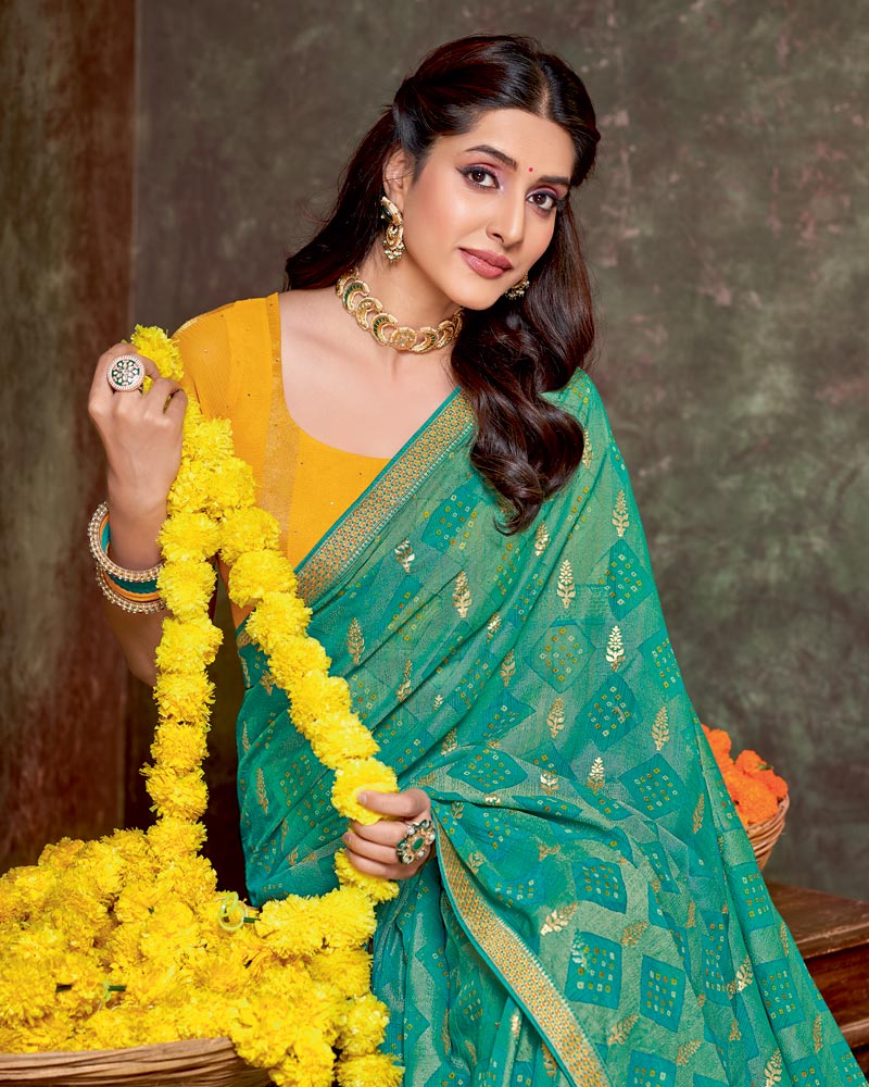 Vishal Prints Jade Green Printed Brasso Traditional Print Saree With Foil Print And Fancy Border