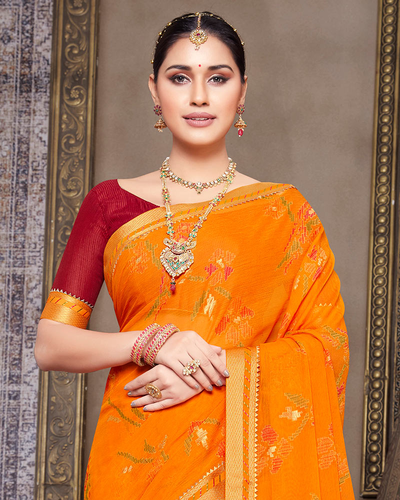 Vishal Prints Orange Brasso Saree With Foil Print And Fancy Border