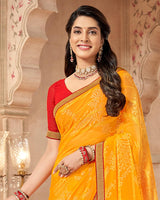 Vishal Prints Yellowish Orange Patterned Brasso Saree With Zari Border