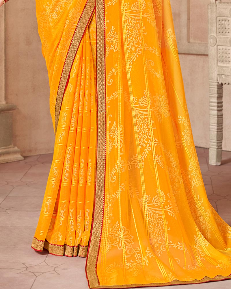 Vishal Prints Yellowish Orange Patterned Brasso Saree With Zari Border
