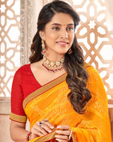 Vishal Prints Yellowish Orange Patterned Brasso Saree With Zari Border