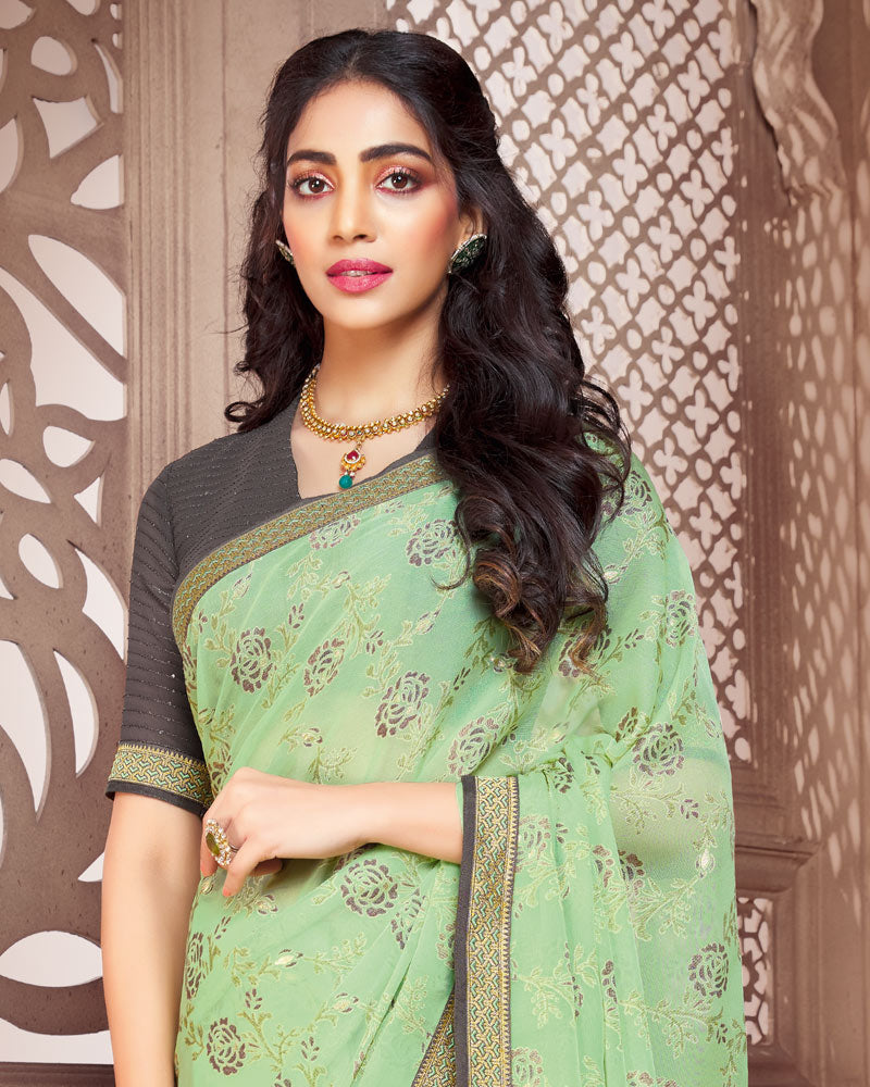 Vishal Prints Dark Salmon Brasso Saree With Foil Print And Zari Border