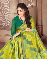 Vishal Prints Dark Aqua Brasso Saree With Foil Print And Zari Border