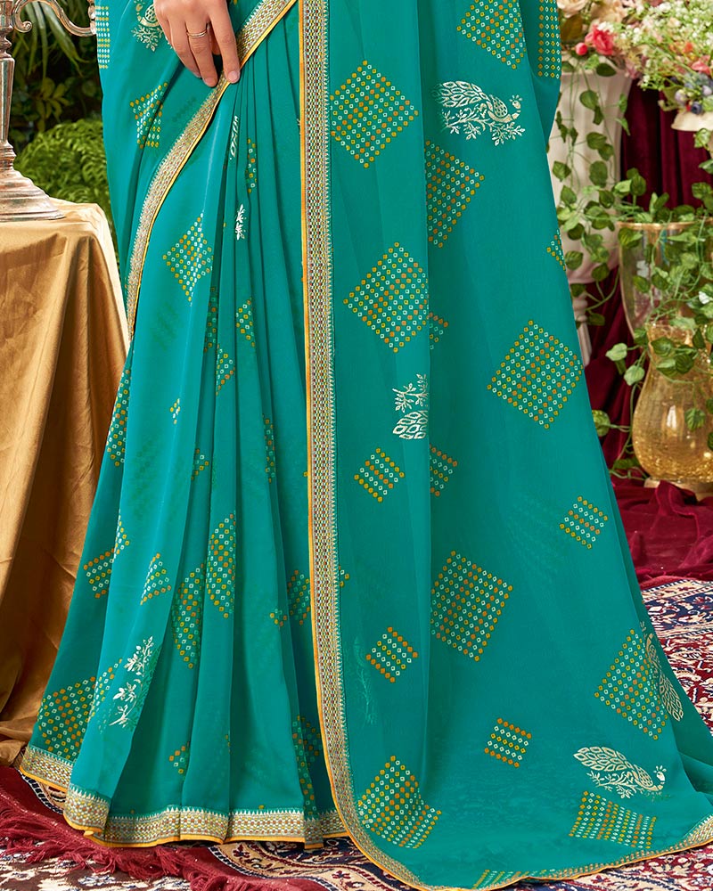 Vishal Prints Teal Blue Printed Georgette Saree With Foil Print And Zari Border