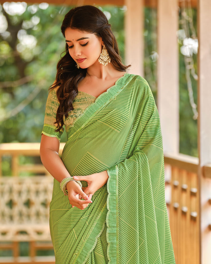 Vishal Prints Moss Green Printed Brasso Saree With Fancy Cut Work Border