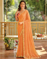 Vishal Prints Dusty Orange Printed Brasso Saree With Fancy Cut Work Border