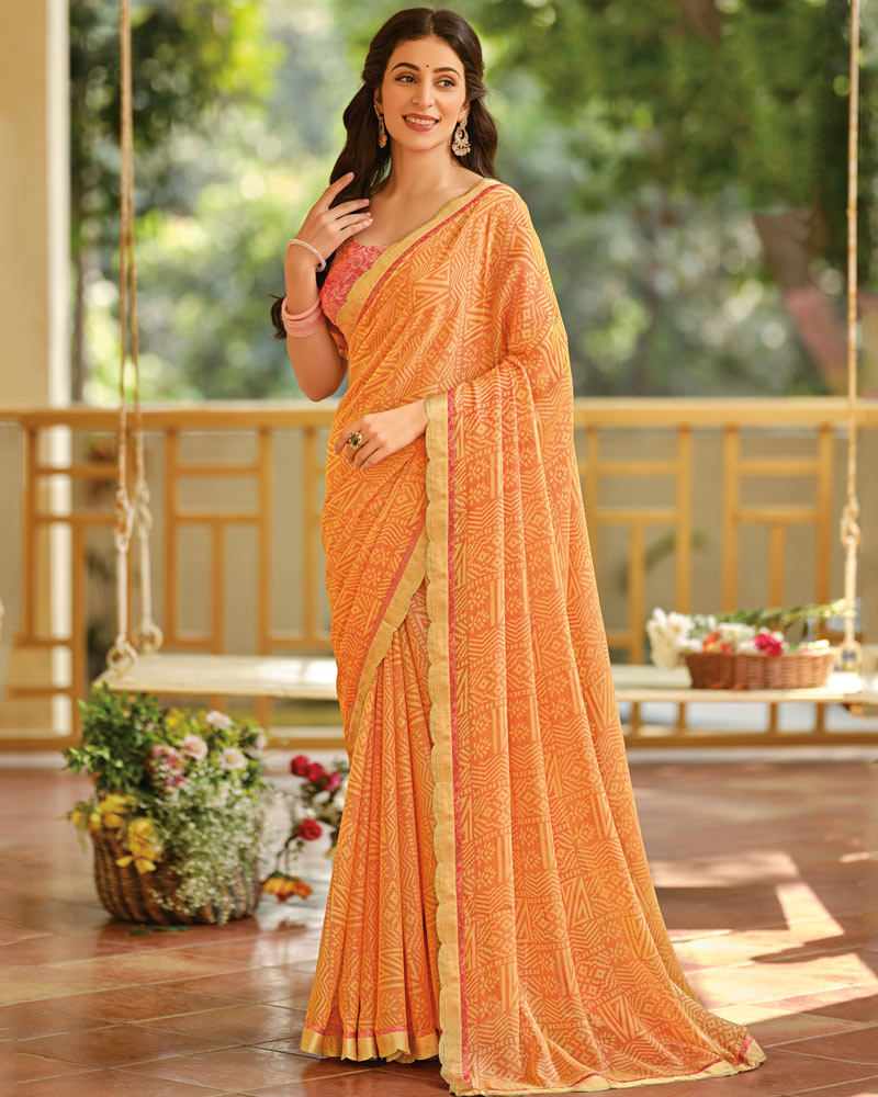 Vishal Prints Dusty Orange Printed Brasso Saree With Fancy Cut Work Border