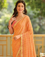 Vishal Prints Dusty Orange Printed Brasso Saree With Fancy Cut Work Border