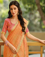 Vishal Prints Dusty Orange Printed Brasso Saree With Fancy Cut Work Border