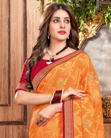 Vishal Prints Saffron Color Brasso Saree With Stone Work And Zari Border