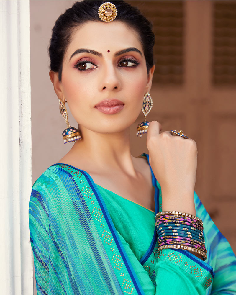 Vishal Prints Turquoise Green Printed Brasso Saree With Fancy Border
