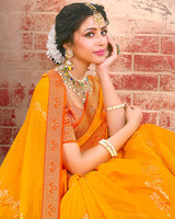 Vishal Prints Yellowish Orange Fancy Brasso Saree With Foil Print And Zari Border