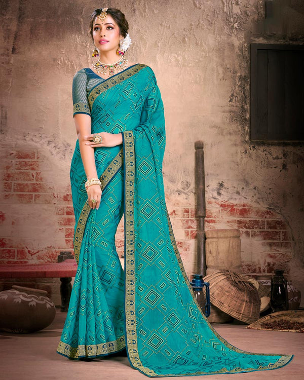 Vishal Prints Teal Blue Fancy Brasso Saree With Foil Print And Zari Border