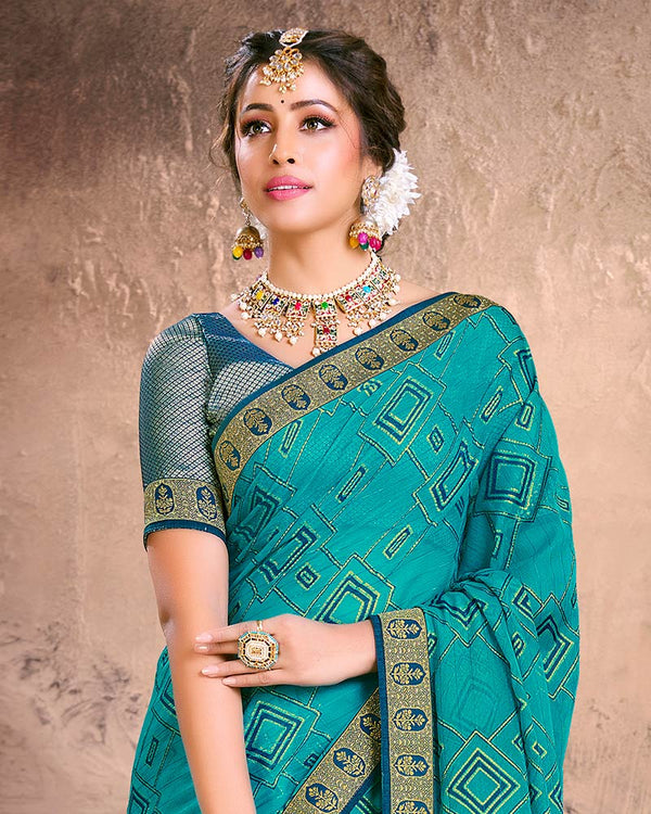 Vishal Prints Teal Blue Fancy Brasso Saree With Foil Print And Zari Border