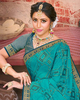Vishal Prints Teal Blue Fancy Brasso Saree With Foil Print And Zari Border