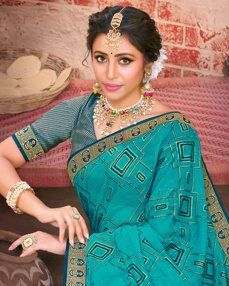 Vishal Prints Teal Blue Fancy Brasso Saree With Foil Print And Zari Border