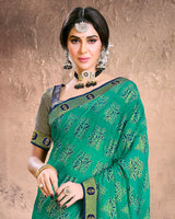 Vishal Prints Dark Mint Green Fancy Brasso Saree With Foil Print And Zari Border