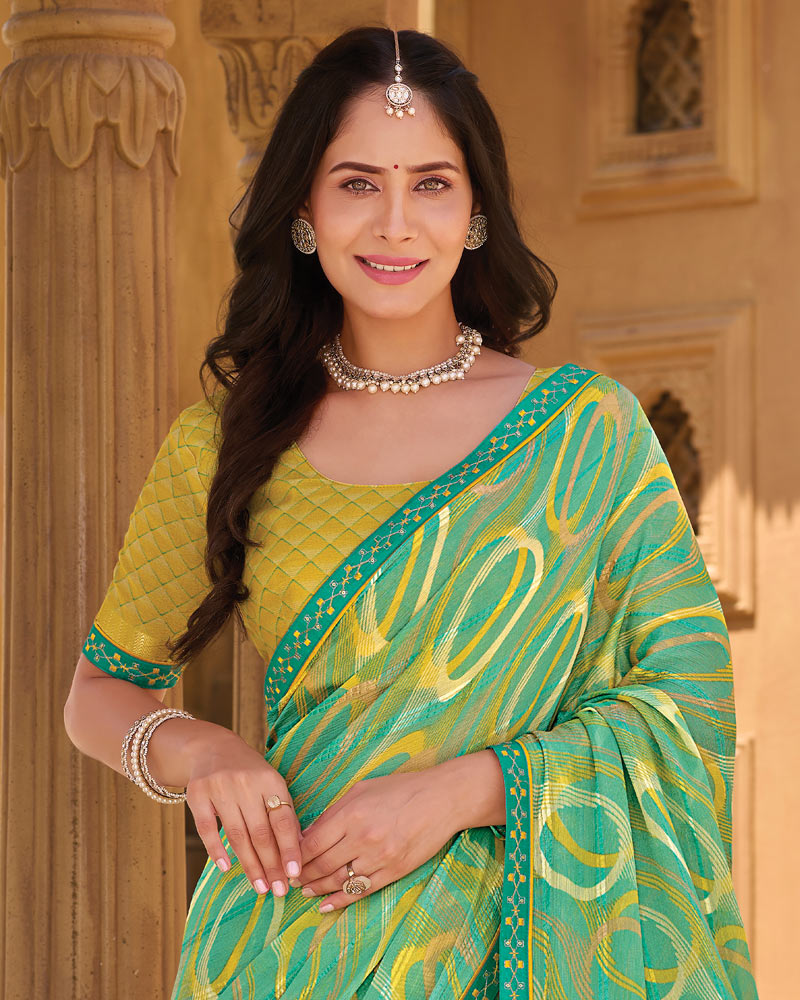 Vishal Prints Light Jade Green Printed Patterned Brasso Saree With Fancy Embroidery Border
