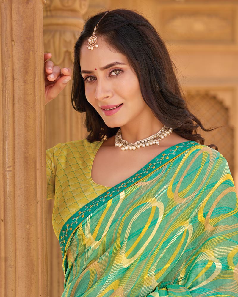 Vishal Prints Light Jade Green Printed Patterned Brasso Saree With Fancy Embroidery Border