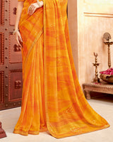 Vishal Prints Saffron Color Printed Georgette Saree With Foil Print And Zari Border