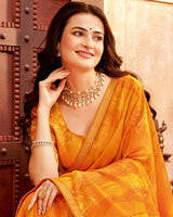 Vishal Prints Saffron Color Printed Georgette Saree With Foil Print And Zari Border
