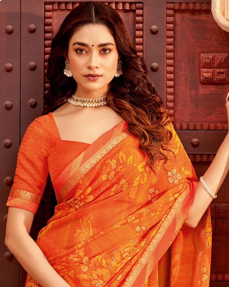 Vishal Prints Dark Orange Printed Georgette Saree With Foil Print And Zari Border