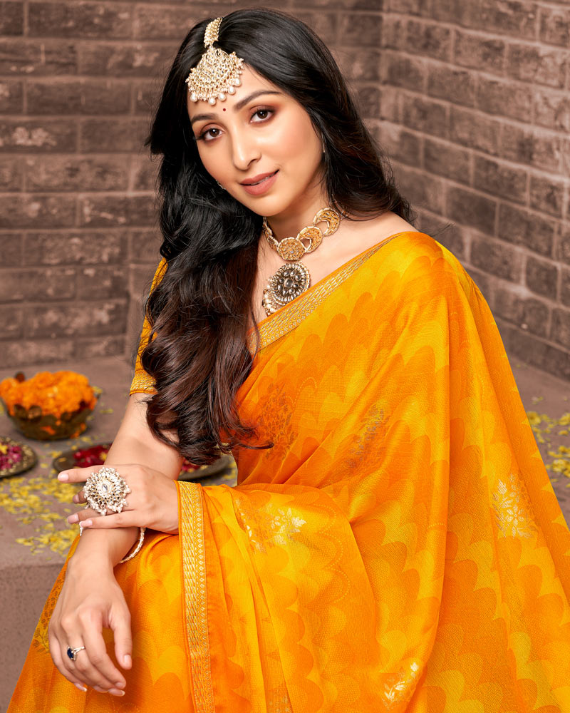 Vishal Prints Yellowish Orange Printed Chiffon Saree With Foil Print And Zari Border