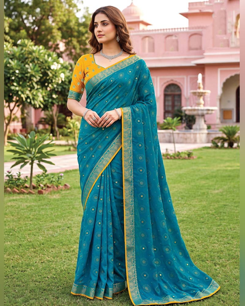 Vishal Prints Deep Aqua Blue Traditional Print Georgette Saree With Mirror Work And Zari Border