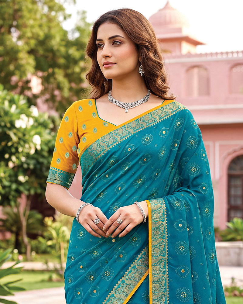 Vishal Prints Deep Aqua Blue Traditional Print Georgette Saree With Mirror Work And Zari Border
