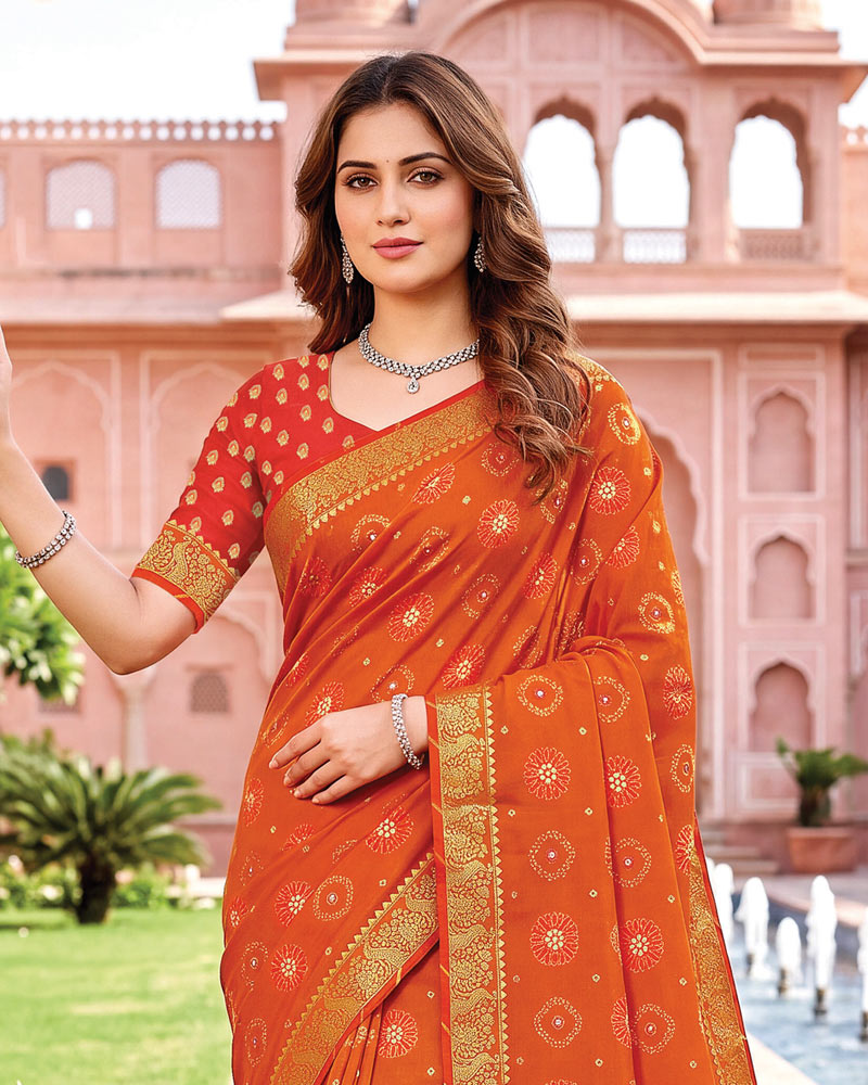 Vishal Prints Flame Orange Traditional Print Georgette Saree With Mirror Work And Zari Border